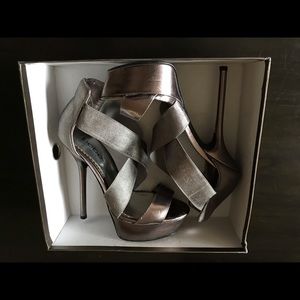 Bebe 8.5 platform elastic heels.